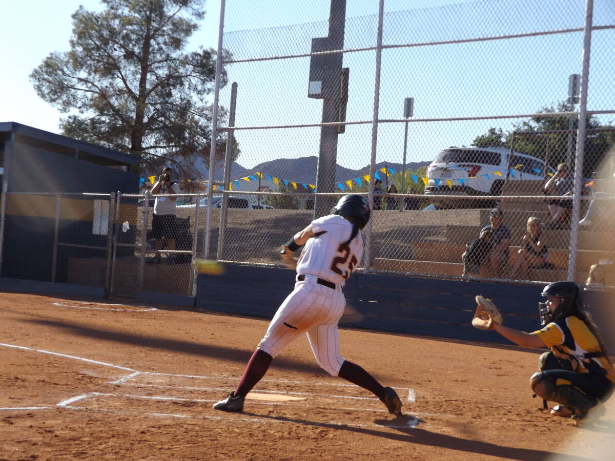 Charlotte Uyeno/Pahrump Valley Times Dannika Cox-Hosino (25) was up to bat as the Lady Trojans ...